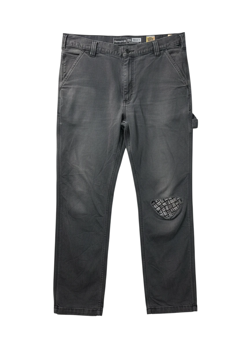 Lahad Vintage Carhartt work pants in charcoal grey denim with a patched knee detail.