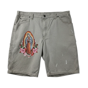Lahad Vintage light-colored carpenter shorts with Virgin Mary and rose graphic on left leg, paint splatters.