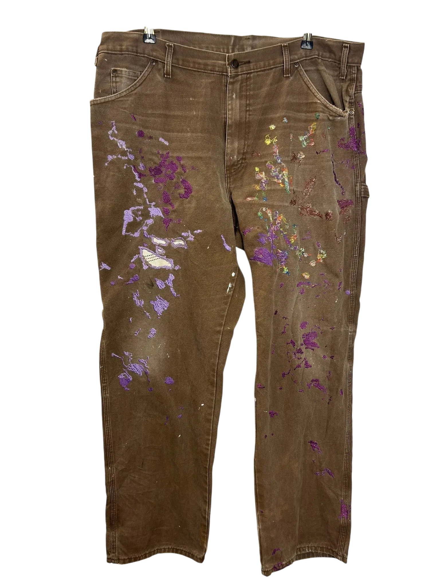 Lahad Vintage custom brown canvas carpenter pants with purple paint splatters and Metukan stitching. Unique workwear style.