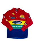 Lahad Vintage long-sleeve button-up shirt with color-block design in red, yellow, green, and blue. Features racing patches and graphics.